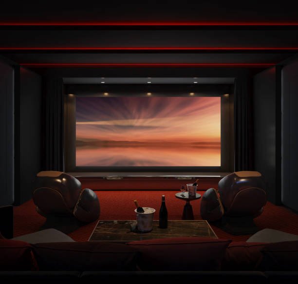 Luxury home theater room with red carpet
